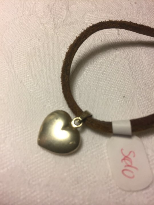 Sølv smykke med læderrem / hjerte